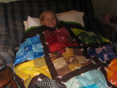 megan-7-2013-her-finsihed-quilt-400x300